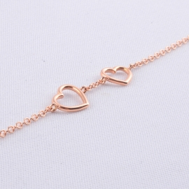 Bracciale con cuori, in oro rosè 18 kt, maglia rollò.